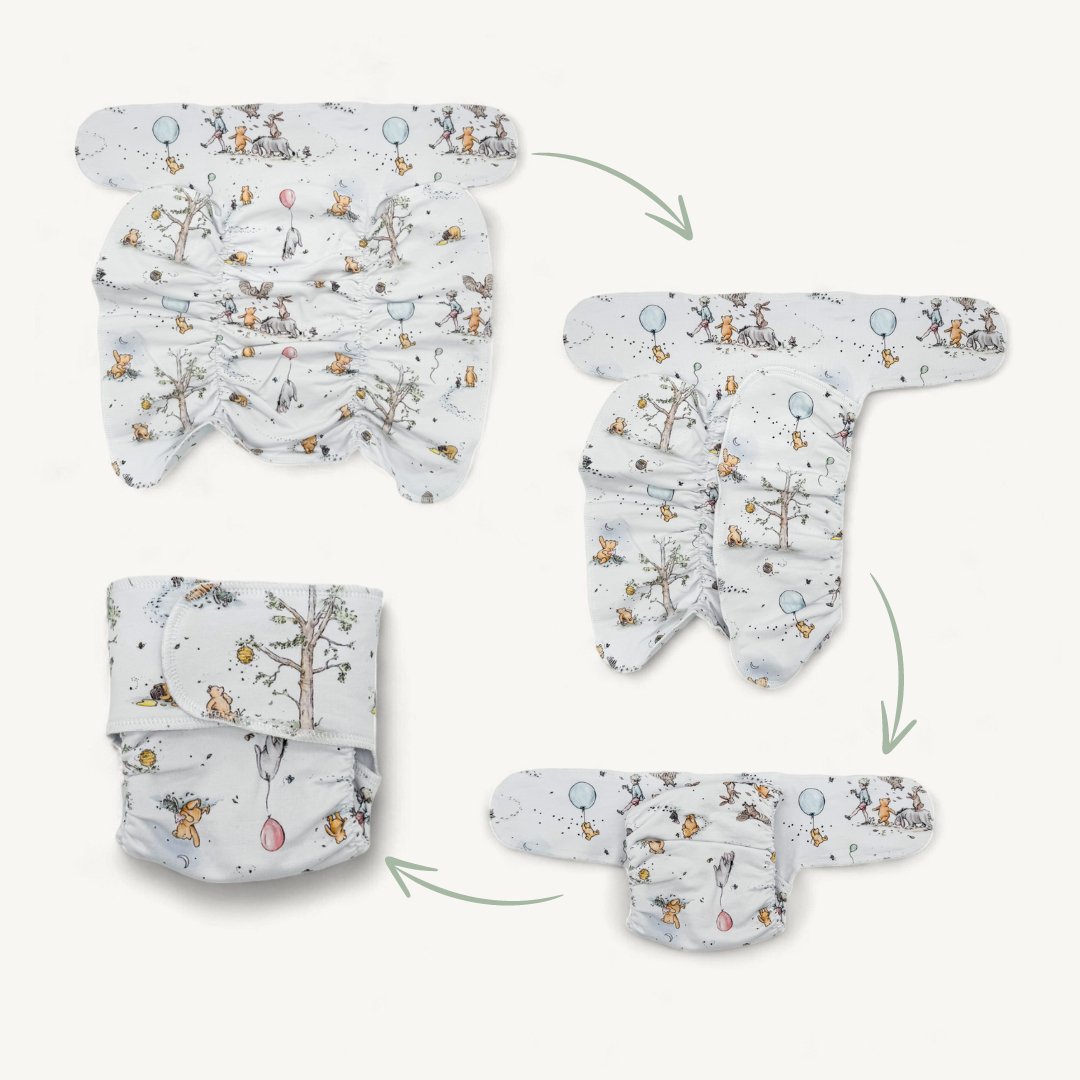 Newborn Stretchy Preflat | Animal Dots - Mimi & Co