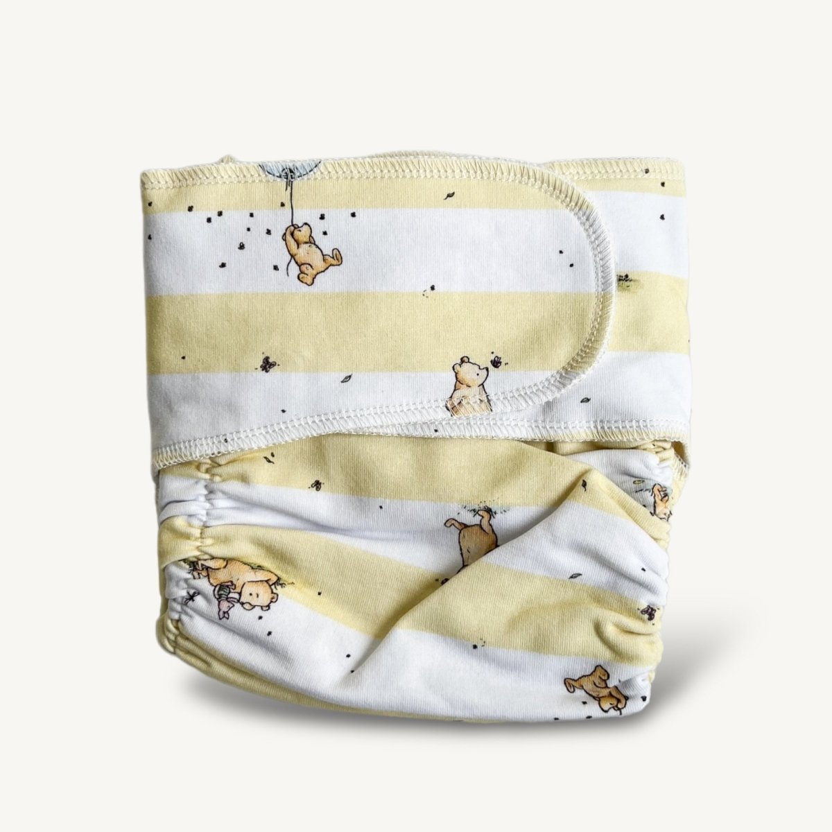 Newborn Stretchy Preflat | Pooh Stripe - Mimi & Co