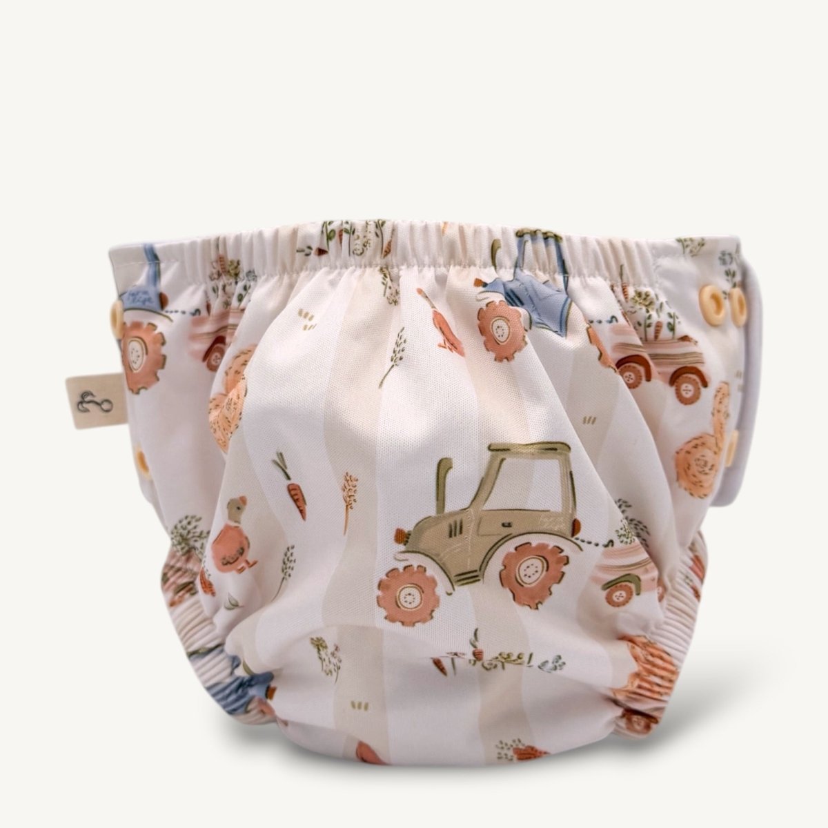 One - Size Reusable Mimi® Swim Nappy | Tractor [Ships Mid May] - Mimi & Co
